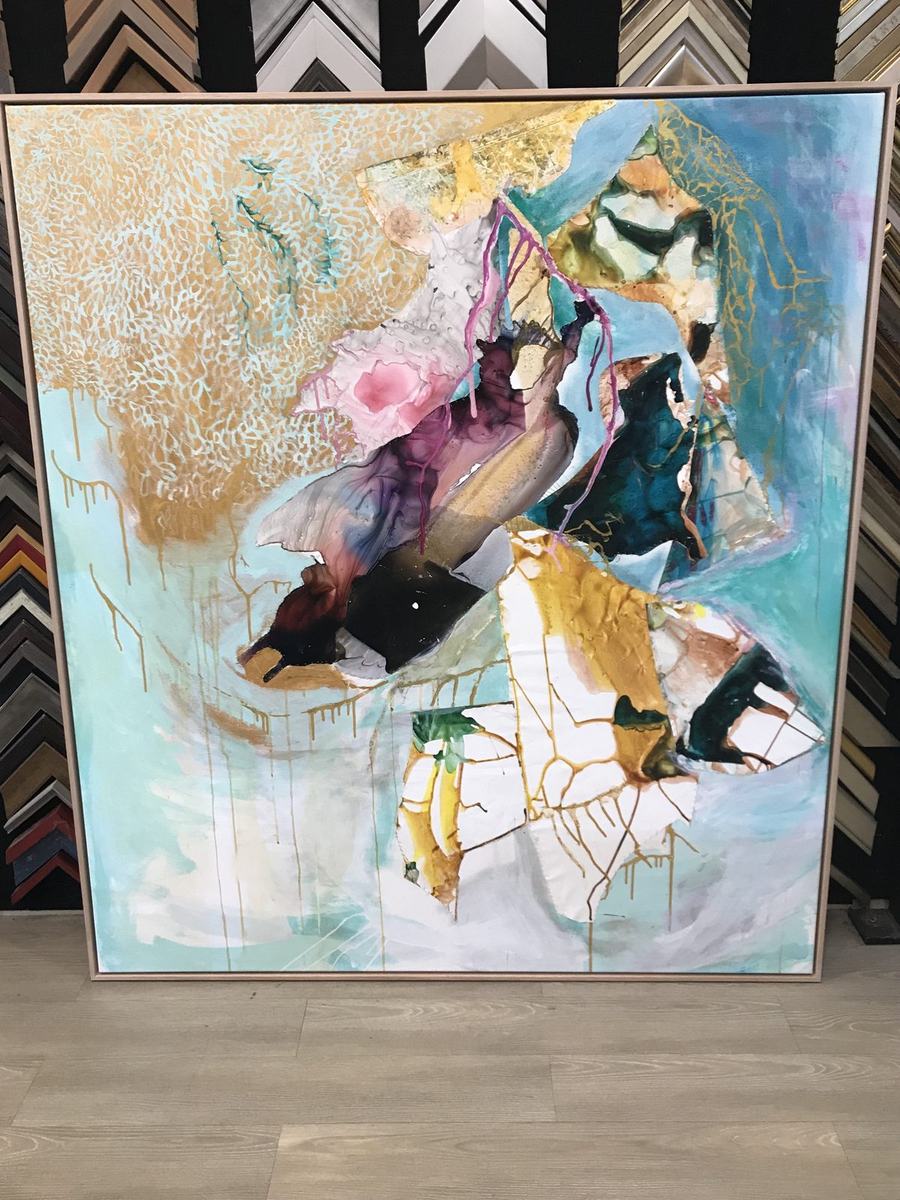 Large abstract artwork in float frame