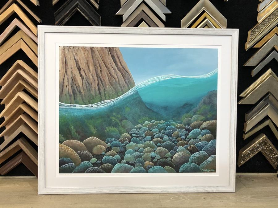 Framed underwater coastal artwork in timber frame