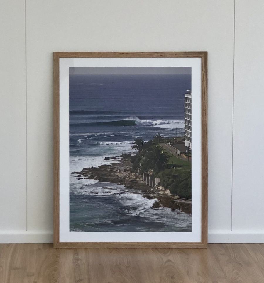 Framed coastal photograph