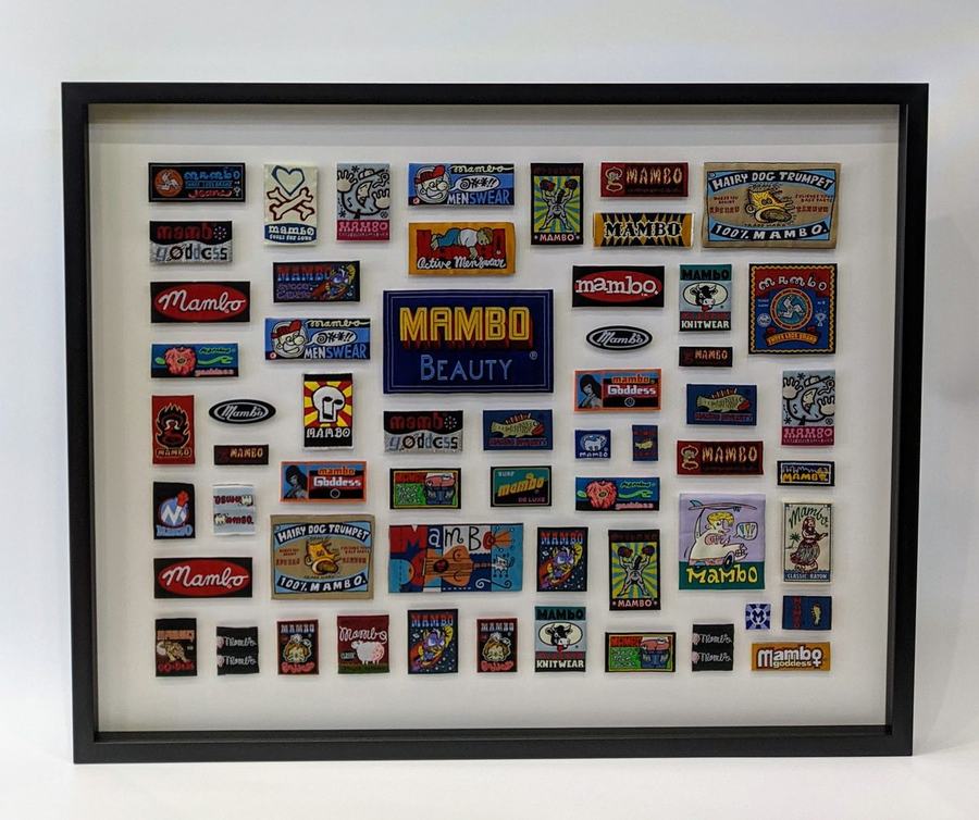 Framed Mambo clothing label collection display