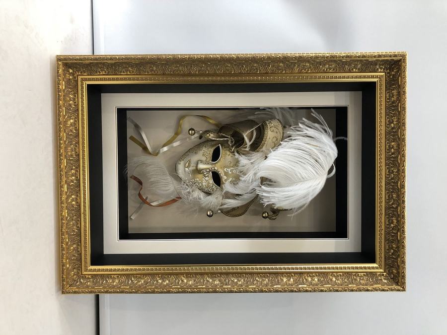 Venetian mask in ornate gold shadow box frame